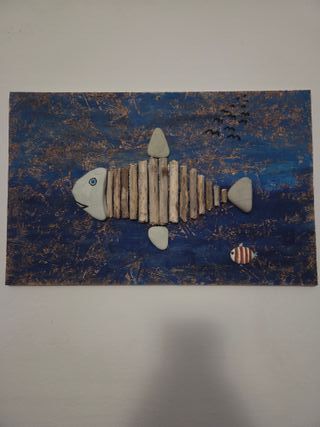 Quadri fatti a mano con pietre e legno