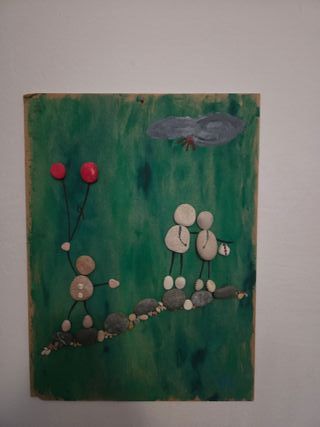 Quadri fatti a mano con pietre e legno