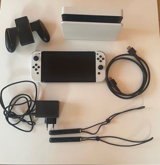 Nintendo Switch OLED + Accesorios y Juegos