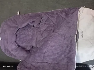 Carro de bebé con saco y plástico de lluvia