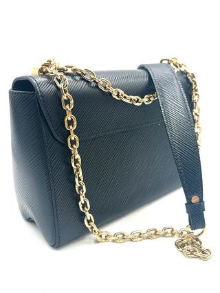 Bolso Louis Vuitton Twist MM Negro Dorado
