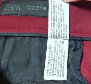 Pantalón Zara acampanado burdeos T.XS