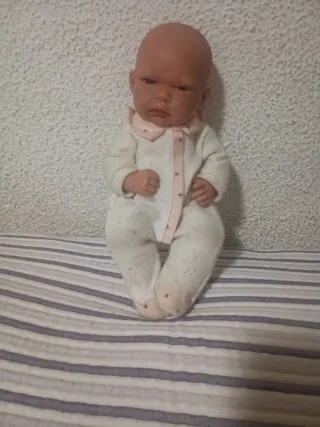 Muñeca con saco de estrellas