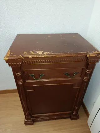 Máquina de coser Singer beige con mueble.