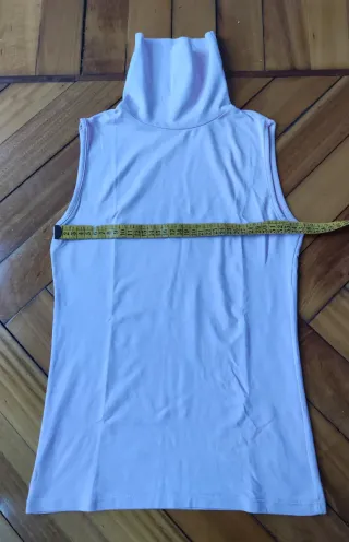Camiseta cuello alto rosa sin mangas Talla S