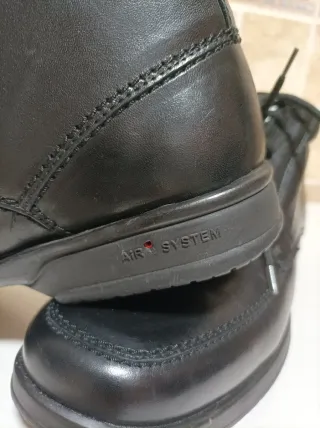 Botín de piel negro para hombre