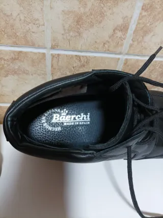 Botín de piel negro para hombre