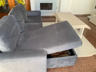 Sofá cama gris de tela