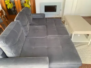 Sofá cama gris de tela