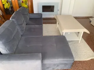 Sofá cama gris de tela