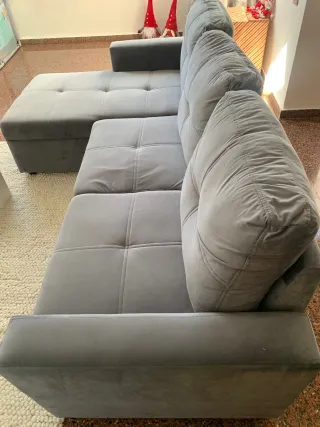 Sofá cama gris de tela