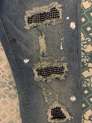 Jeans Amiri uomo strappati