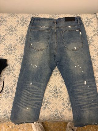 Jeans Amiri uomo strappati