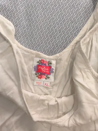 Top Pepita Pérez blanco con flecos