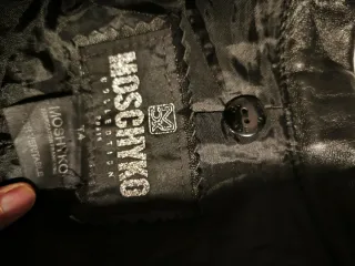 Gabardina de Piel Negra Larga en perfecto estado.