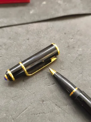 Bolígrafo Cartier Must Diábolo Negro Dorado