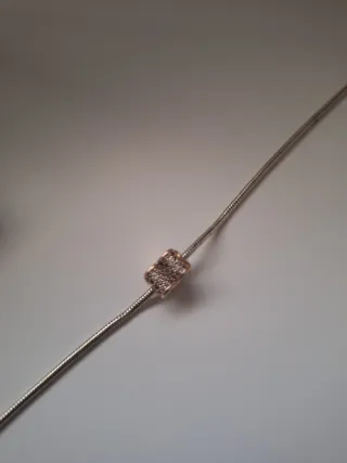 Pulsera Pandora con corazón rosa