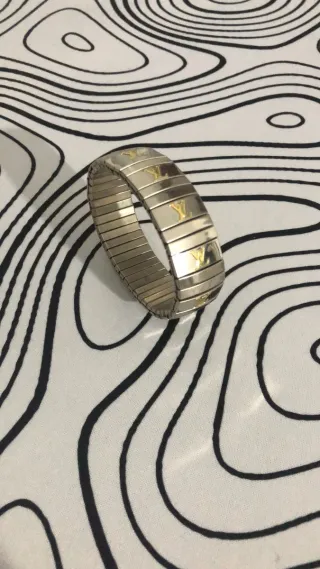 Pulsera Louis Vuitton eslabones dorados y plateado