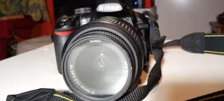 Nikon D3100 + Obiettivo 18-55mm VR + caricatore + custodia