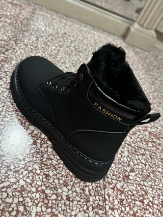 Stivali modello Timberland molto calde.