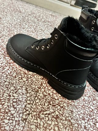 Stivali modello Timberland molto calde.