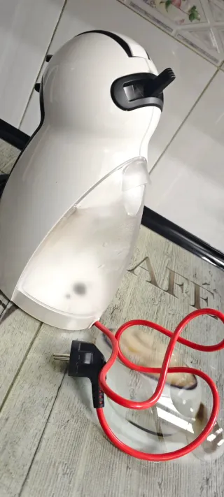 Cafetera Dolce Gusto Blanca y Negra