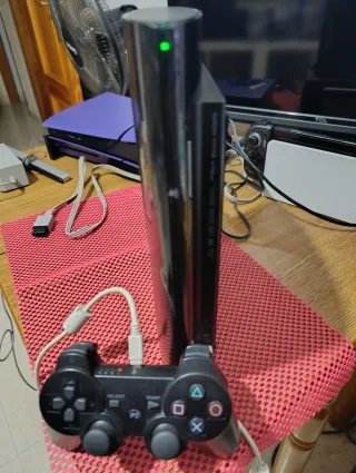 PS3 Super Slim con muchos juegos