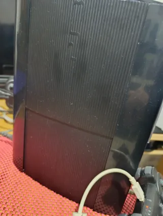 PS3 Super Slim con muchos juegos