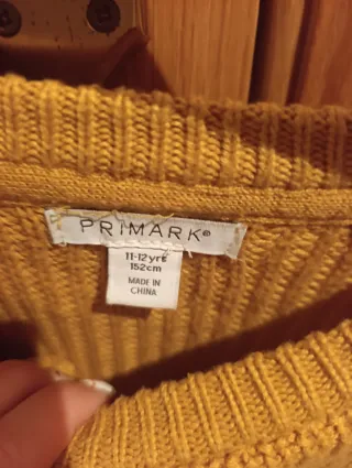 Jersey marrón con lazos negros