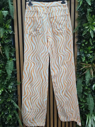 Pantalón Zara ondas naranja y blanco