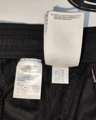 Pantalón chándal Adidas negro con rayas blancas