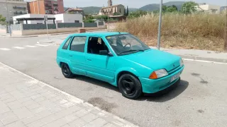 Citroen AX y Opel Kadett E AX y Kadett 1995