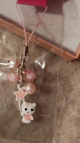 Cojín Dance y pulsera y colgante Hello Kitty