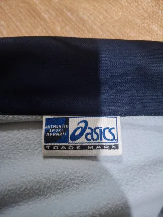 Giacca Asics blu e grigia