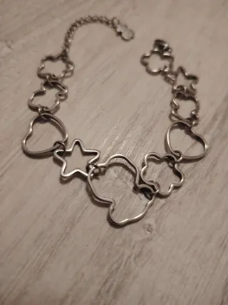 Pulsera de plata con charms