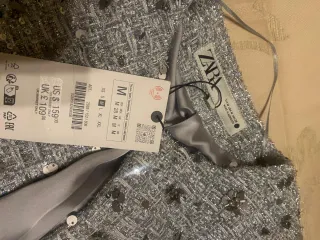 Chaqueta Zara Lentejuelas Doradas y Plateadas