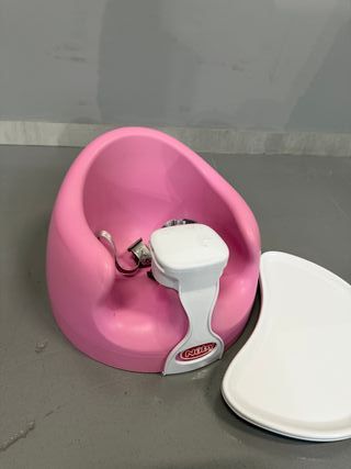 Asiento infantil rosa con bandeja para bebé