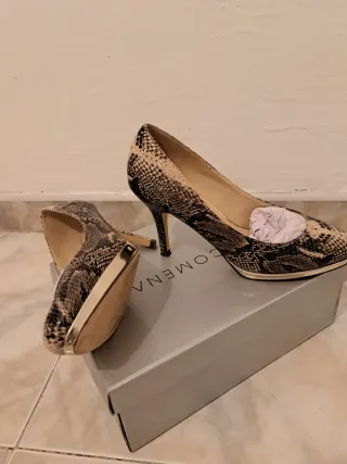Zapatos de tacón serpiente Un solo uso