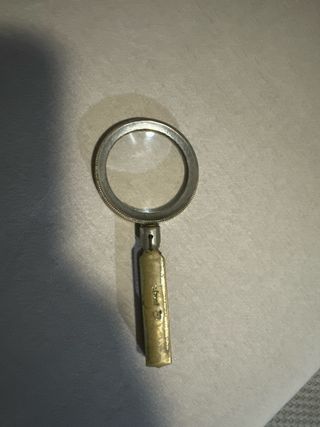 Lupa antigua de bronce