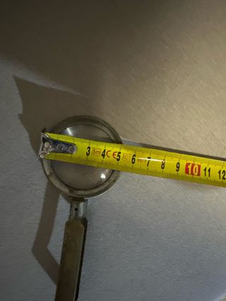 Lupa antigua de bronce