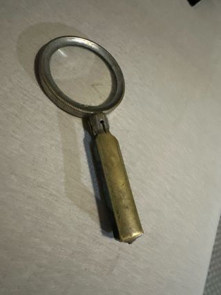 Lupa antigua de bronce