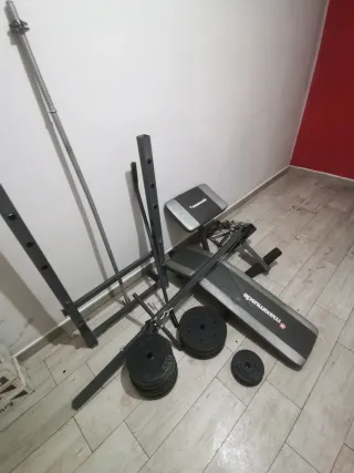 Banco de pesas y accesorios