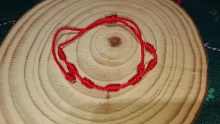 Pulsera 7 nudos roja hecha a mano