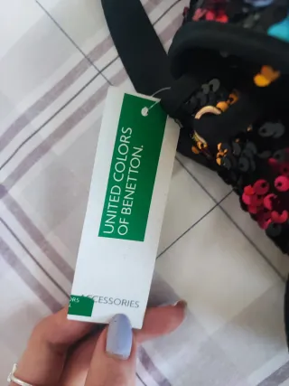 Mochila Benetton lentejuelas multicolor