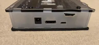 Mister FPGA con carcasa y fuente