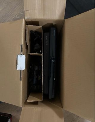 PlayStation 3 con volante y micrófonos
