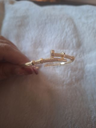 Pulsera ajustable caña clavo dorada acero