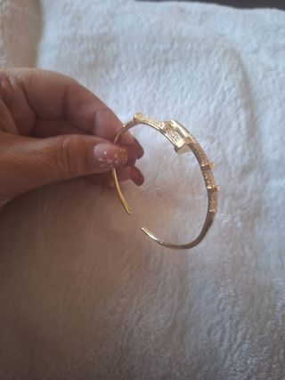 Pulsera ajustable caña clavo dorada acero
