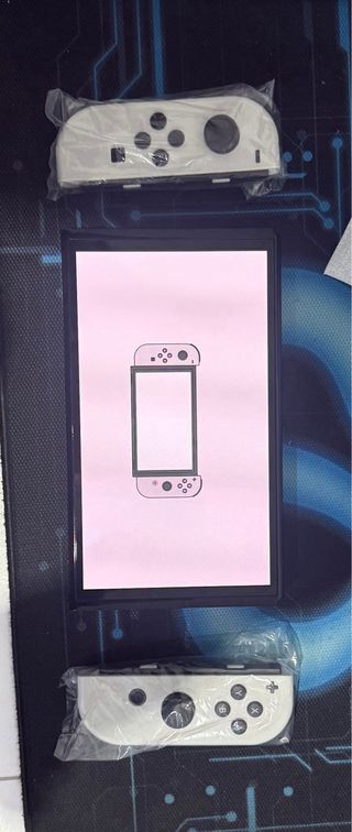 Nintendo Switch OLED(10-15 horas de uso) con funda