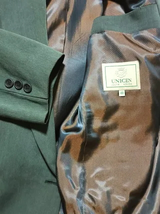 Traje de chaqueta verde oscuro